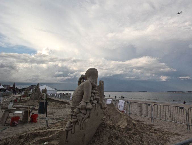boston revere beach sand sculpture festival mushroom kid plane