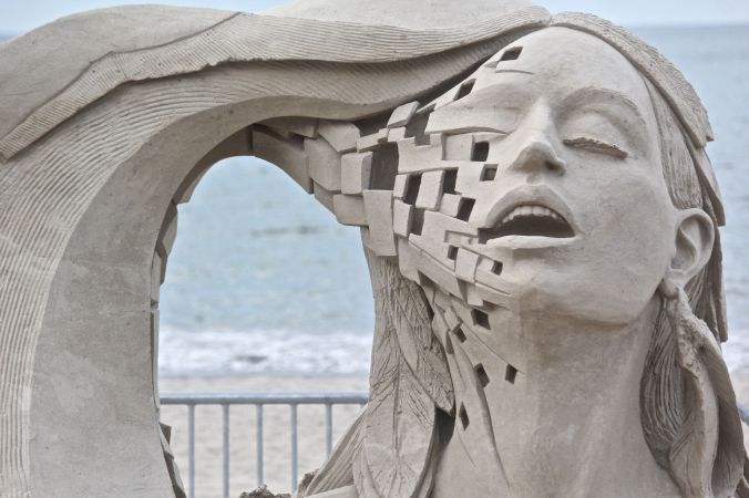 boston revere beach sand sculpture festival woman with wave