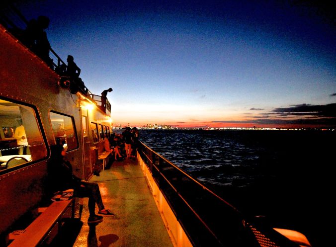 boston harbor cruise sunset people
