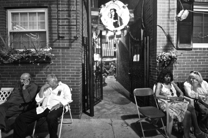 boston north end festival people sitting on the sides