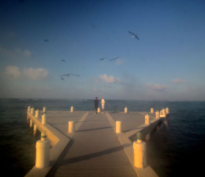 cayman islands reef resort dock out of focus
