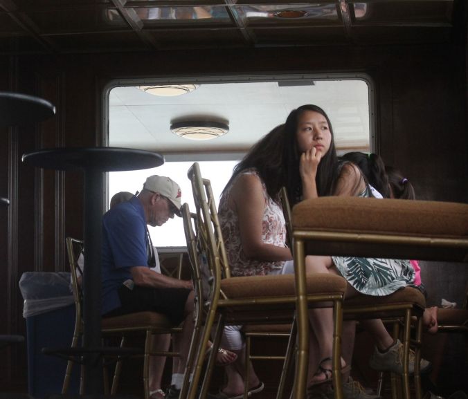 boston harbor cruise lounge person