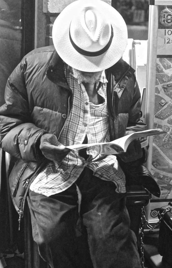 cambridge-out-of-town-news-stand-man-with-white-hat